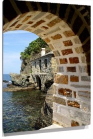 Lienzo Ventana piedra al mar