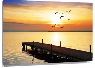 Lienzo muelle al mar gaviotas atardecer